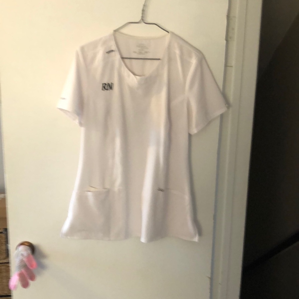 R61.    RN uniform top
